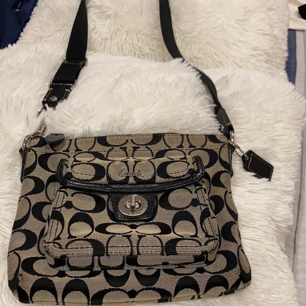 Coach,Grey&Black purse with front pocket/zipper.